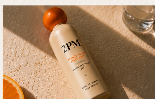 2PM Reset Mist product concept in warm directional light